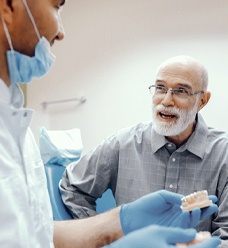 Dentist explaining post op instructions in Jacksonville to patient