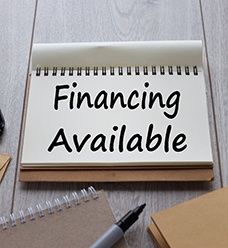 Notepad with the words financing available