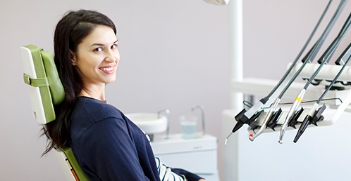 woman sitting in dentist chair