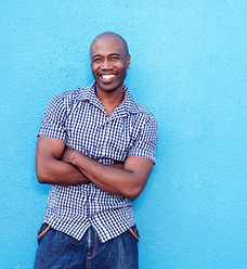 Smiling man who has undergone gum grafting in Jacksonville