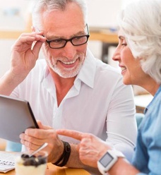 Couple looking at tablet