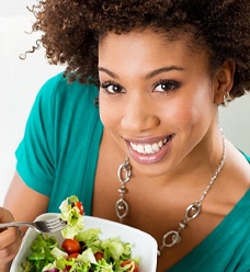Woman eating salad in Jacksonville