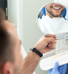 Man with implant dentures in Jacksonville