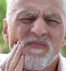 man with mouth pain