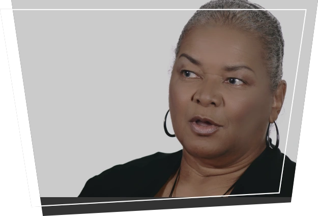 Smiling dental patient checking out