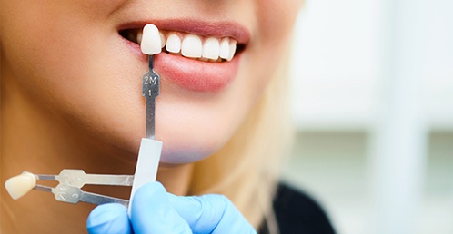 Woman getting dental veneers in Jacksonville