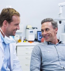 dentist and patient discussing sedation dentistry in Jacksonville