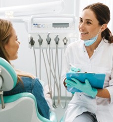 Cosmetic dentist talking to a patient about teeth whitening in Jacksonville
