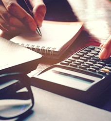 Woman using a calculator