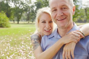 portrait of a couple embracing in the park