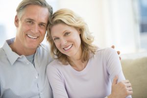 older couple smiling at home