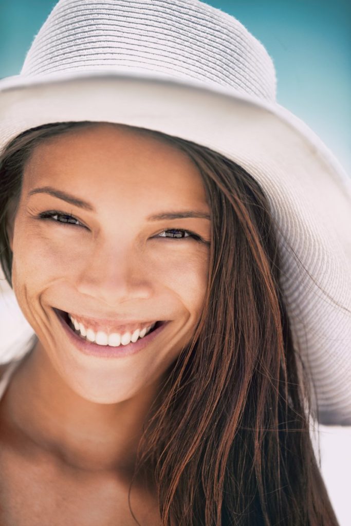 a woman with overgrown gums