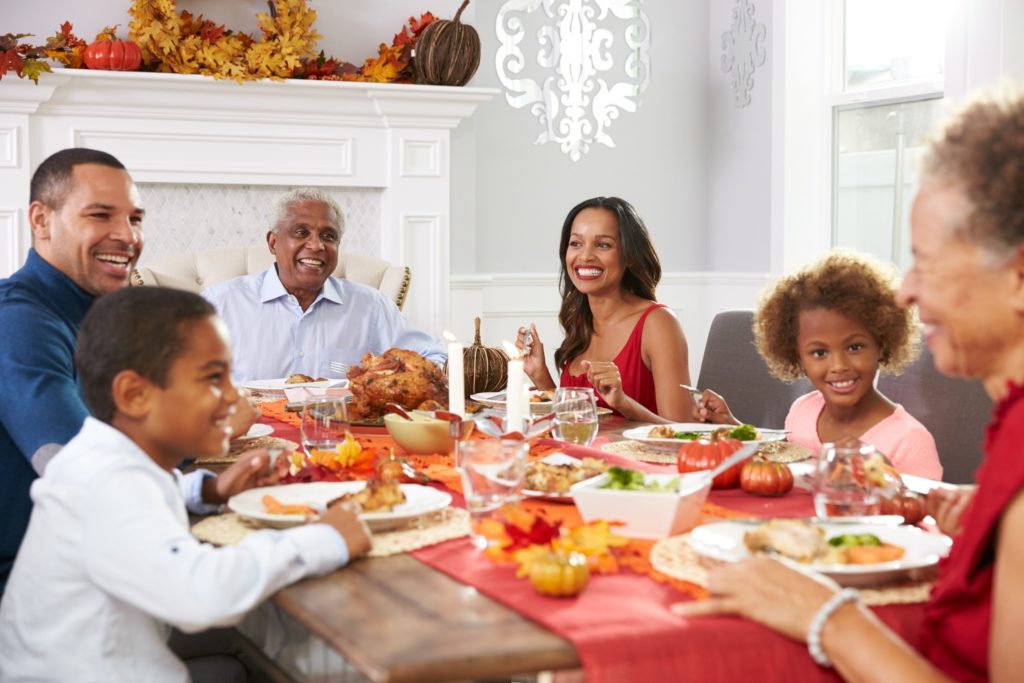 Family enjoying Thanksgiving meal together