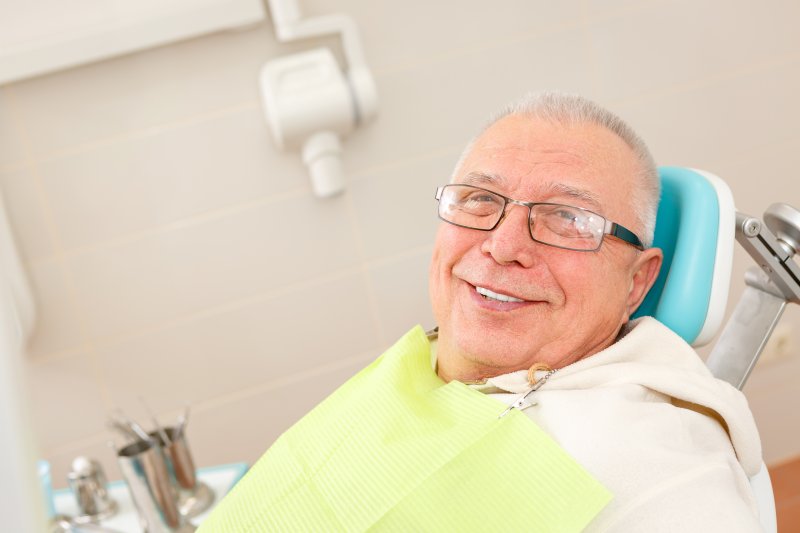 Man receiving dental implants