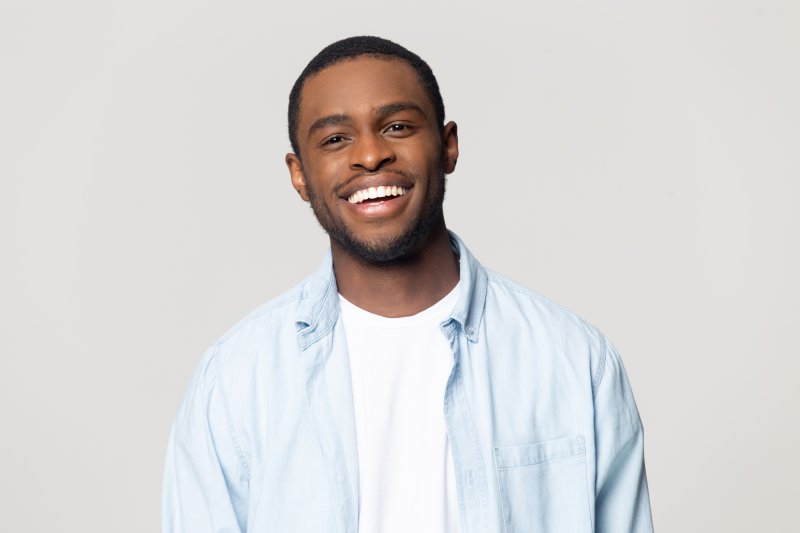 Man smiling after teeth whitening