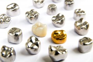 Assortment of metal crowns.